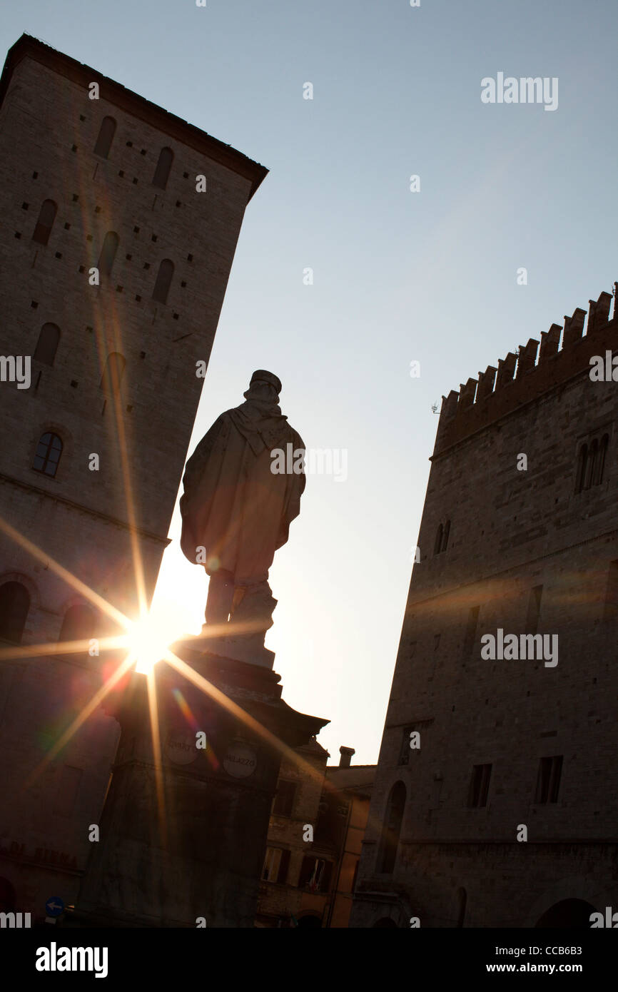 The statue to Giuseppe Garibaldi silhouetted by the sun. Todi, Umbria, Italy. Stock Photo