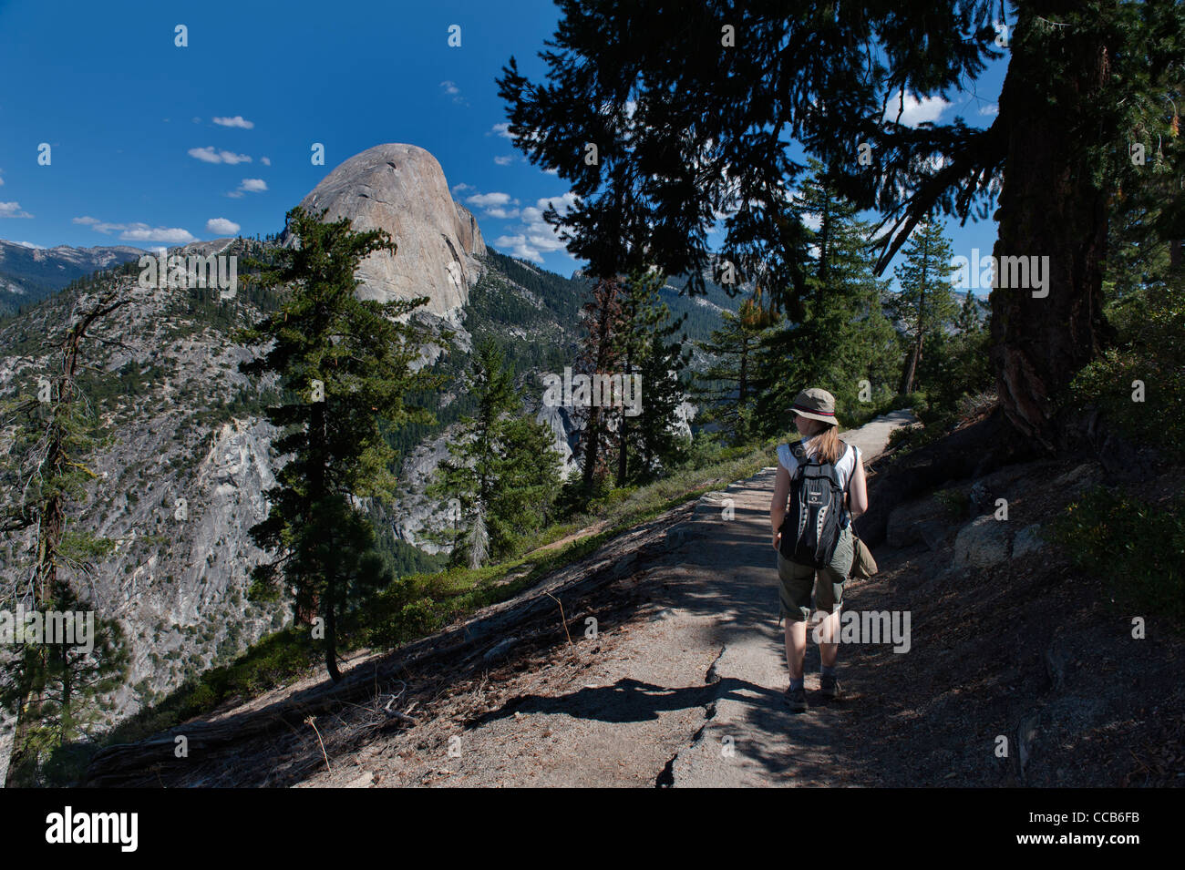 Hiking The Panoramic Trail. Liberty Cap. Yosemite National Park. California. USA Stock Photo