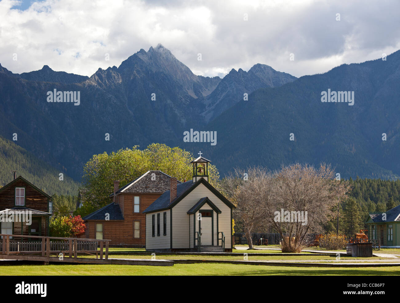 Canadian Rockies and village with a church Stock Photo