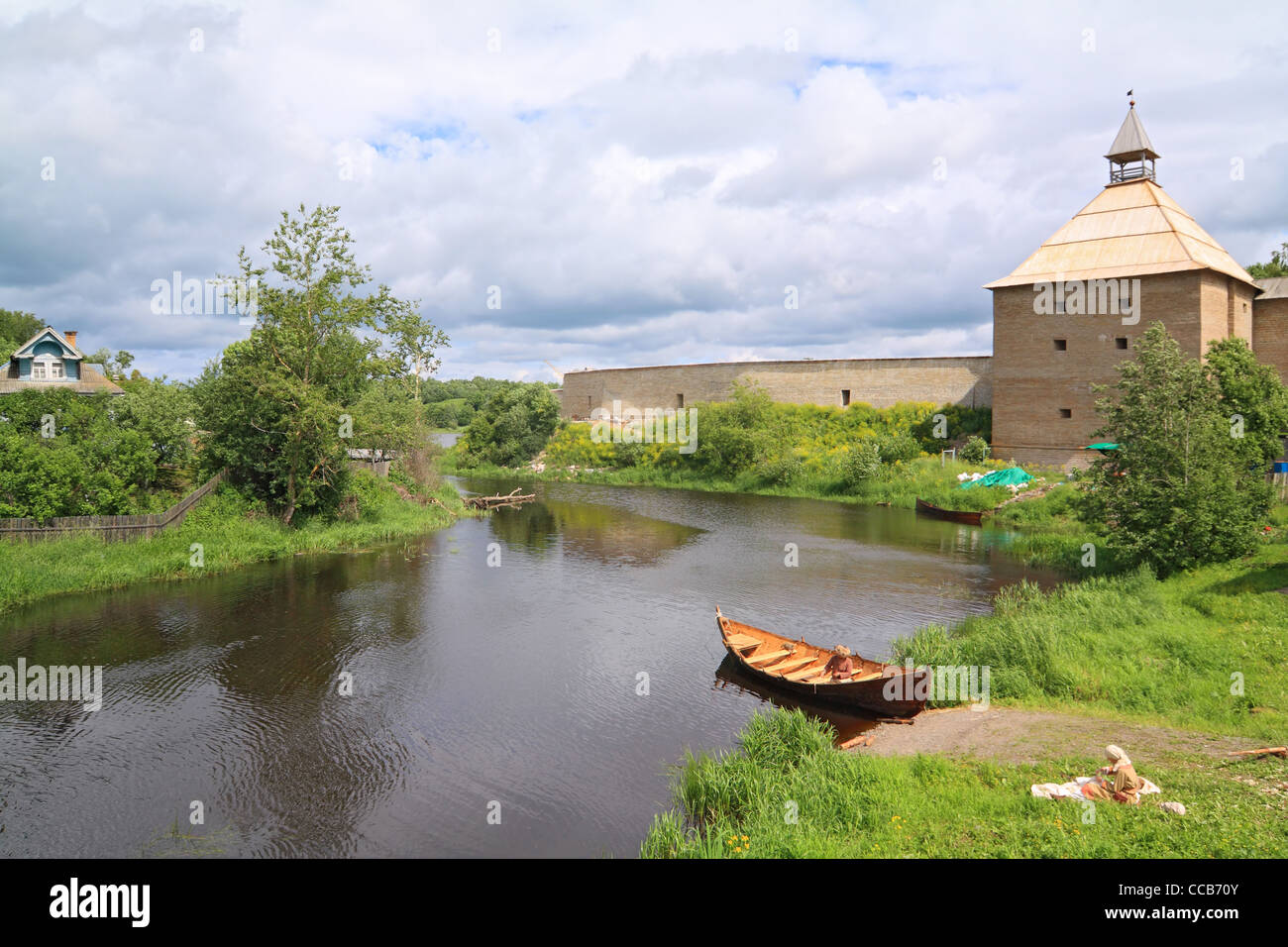 wooden boat on coast river Stock Photo - Alamy