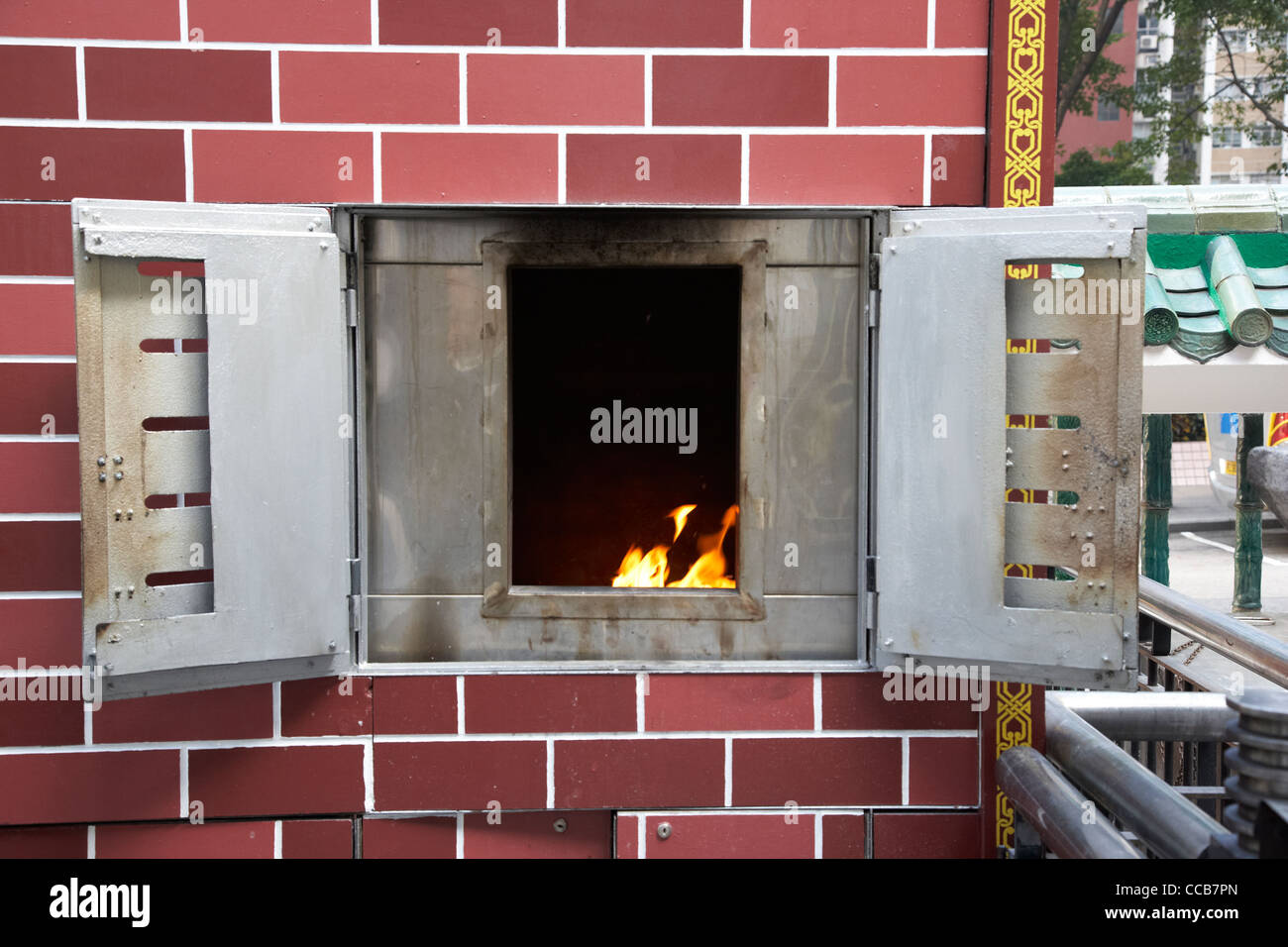 open fire for burning joss paper offerings man mo temple sheung wan hong kong hksar china asia Stock Photo