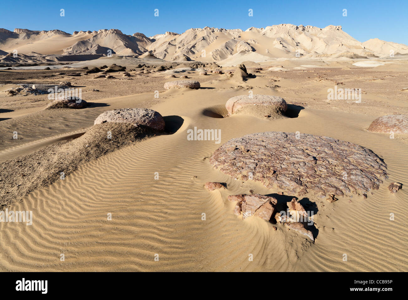 White limestone intrusion on edge of yardang field Dakhla Oasis Egypt Africa Stock Photo Alamy