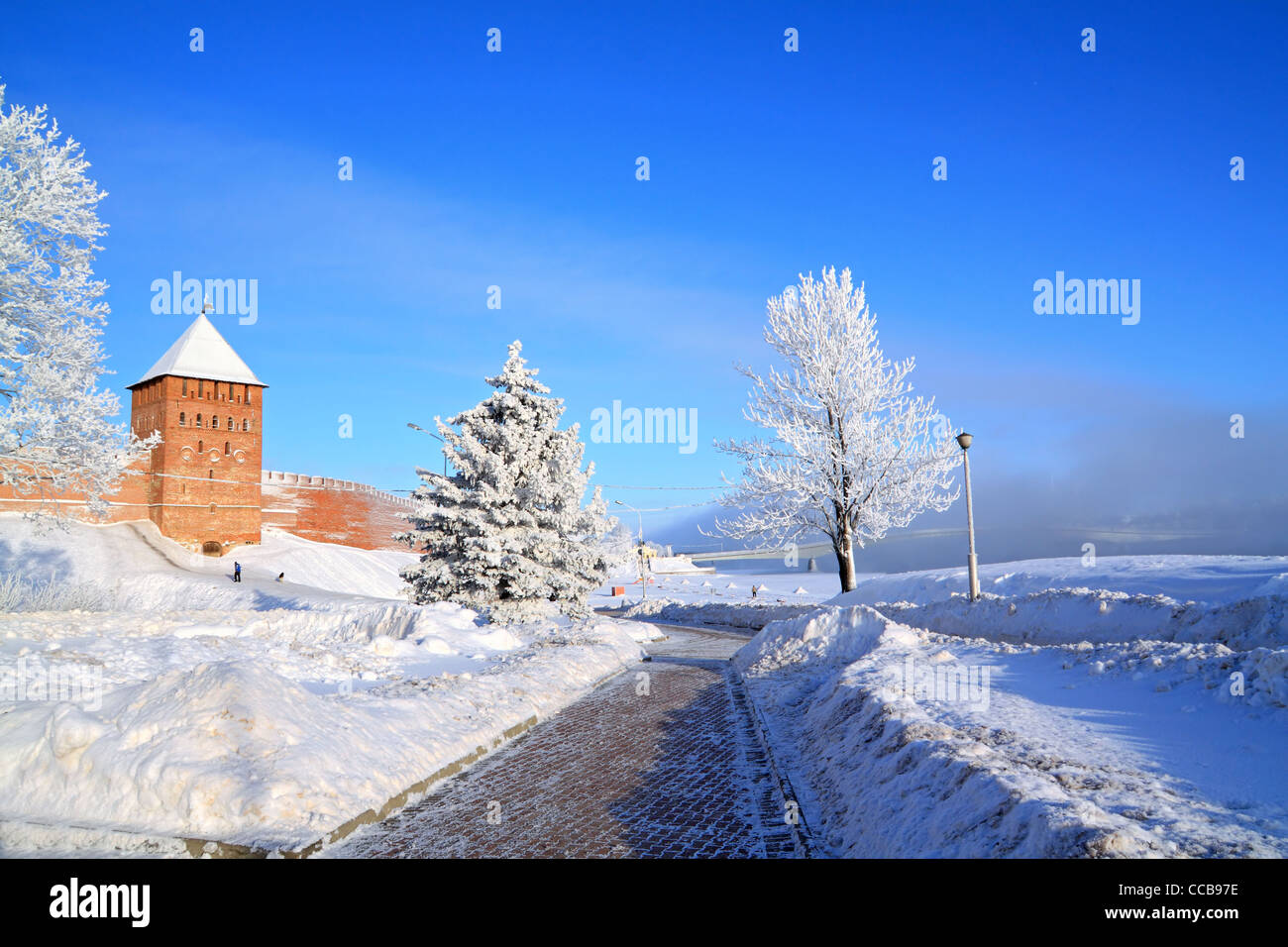 snow road near old fortress Stock Photo