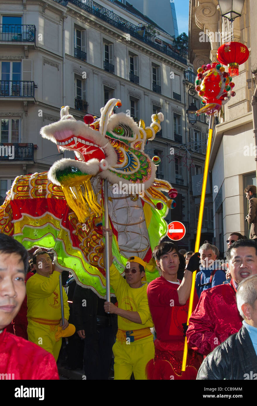 Paris, France, Men Dancing Dragon Dance, Parading in 'Chinese new year', Carnival in Street Stock Photo