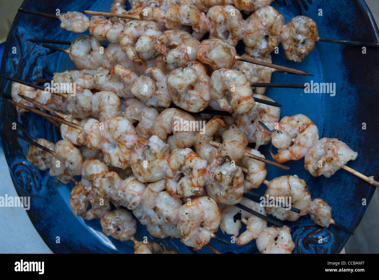 Shrimp skewers for a barbeque Stock Photo Alamy