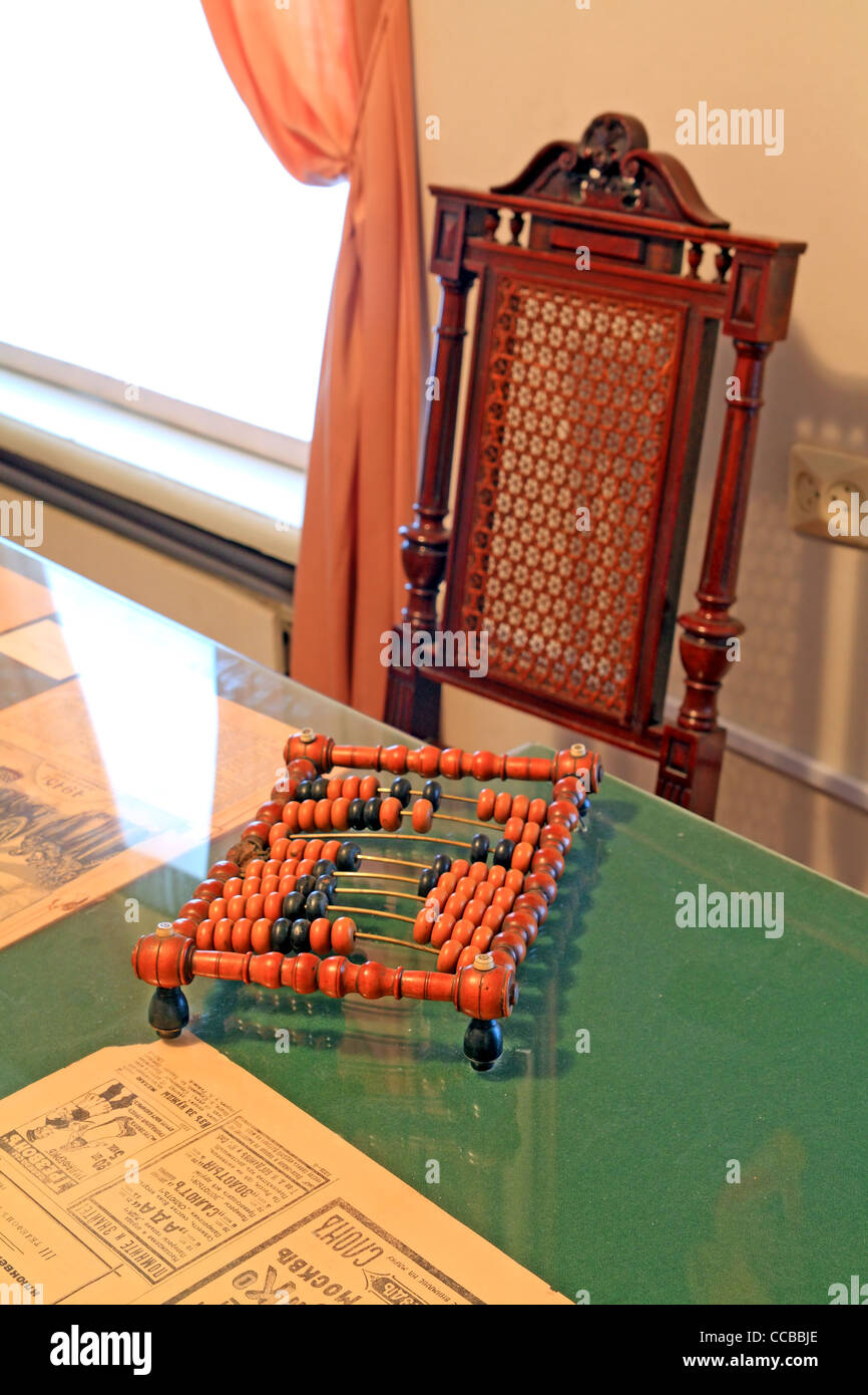 wooden abacus on green table Stock Photo