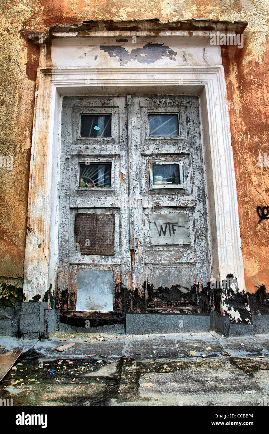 aging door in destroyed house Stock Photo