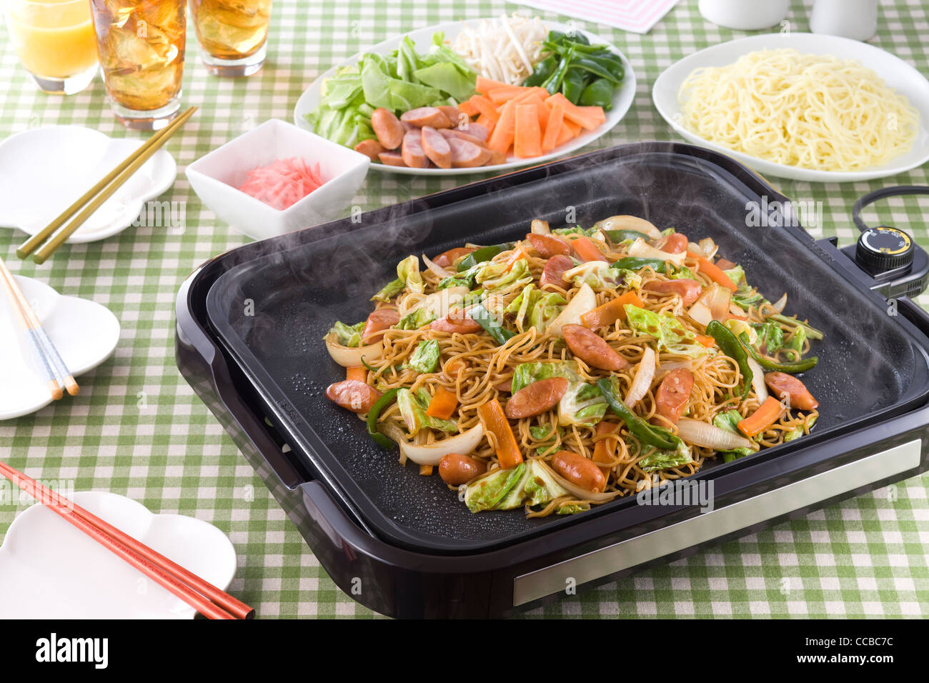 Fried Noodles on Hot Plate Stock Photo