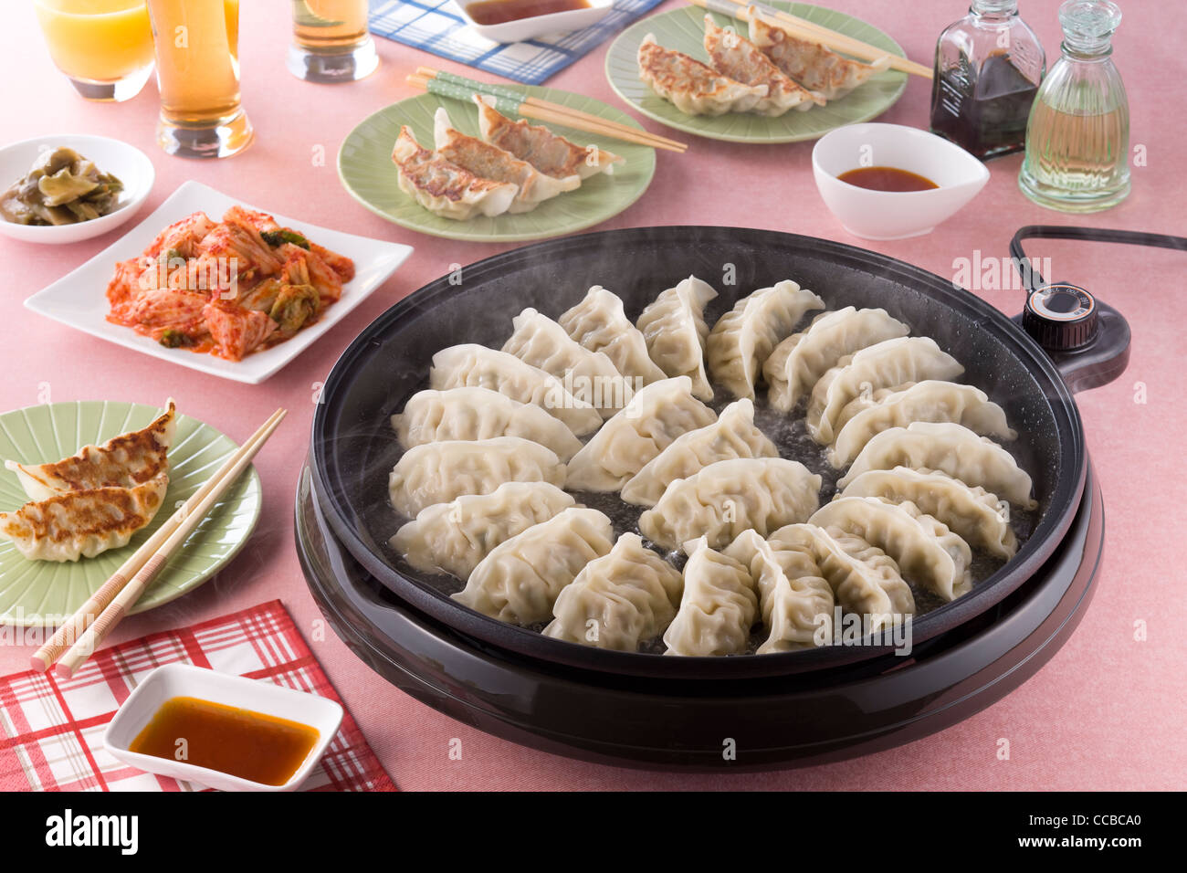 Pot Sticker on Hot Plate Stock Photo