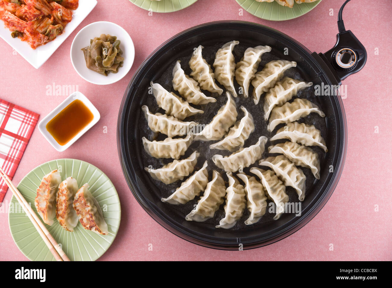 Pot Sticker on Hot Plate Stock Photo