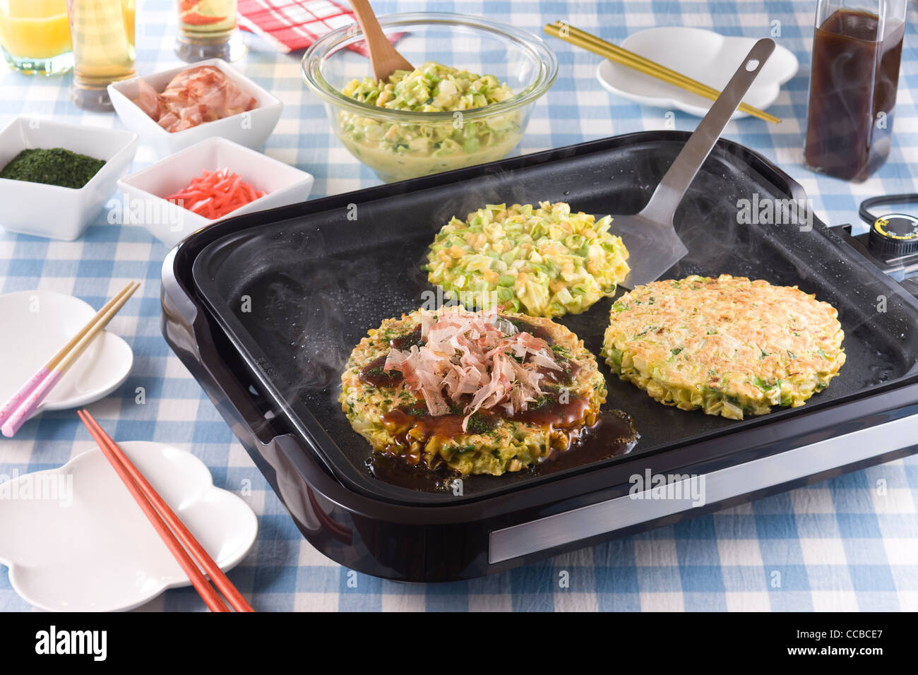 Okonomiyaki on Hot Plate Stock Photo