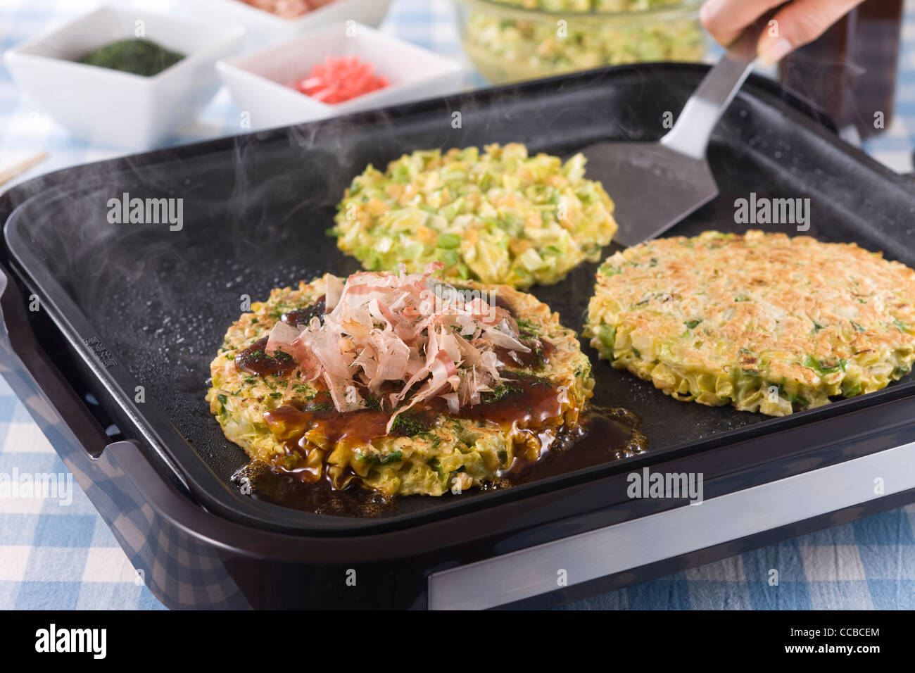 Okonomiyaki on Hot Plate Stock Photo