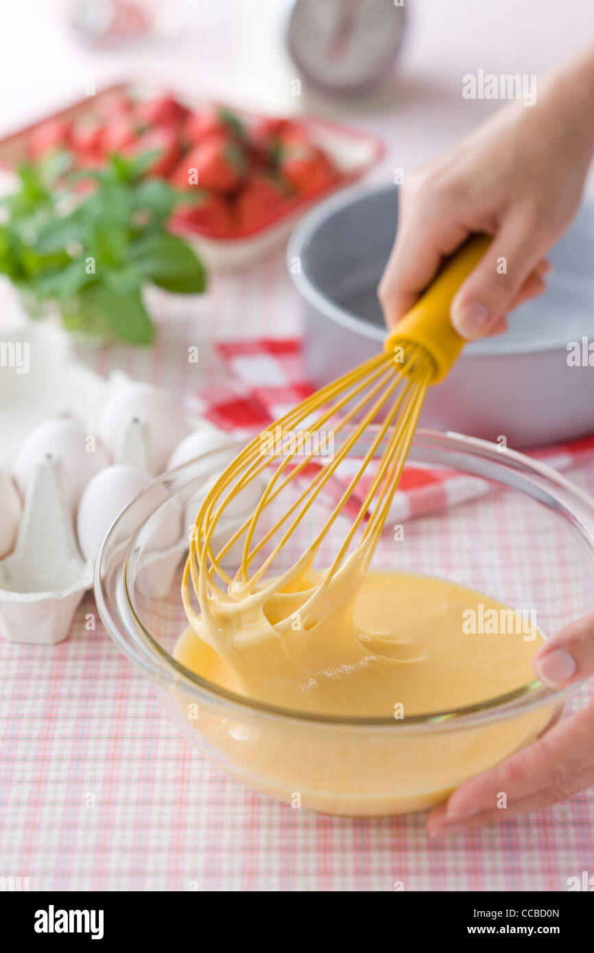 Human Hands Whisking Cake Batter Stock Photo Alamy