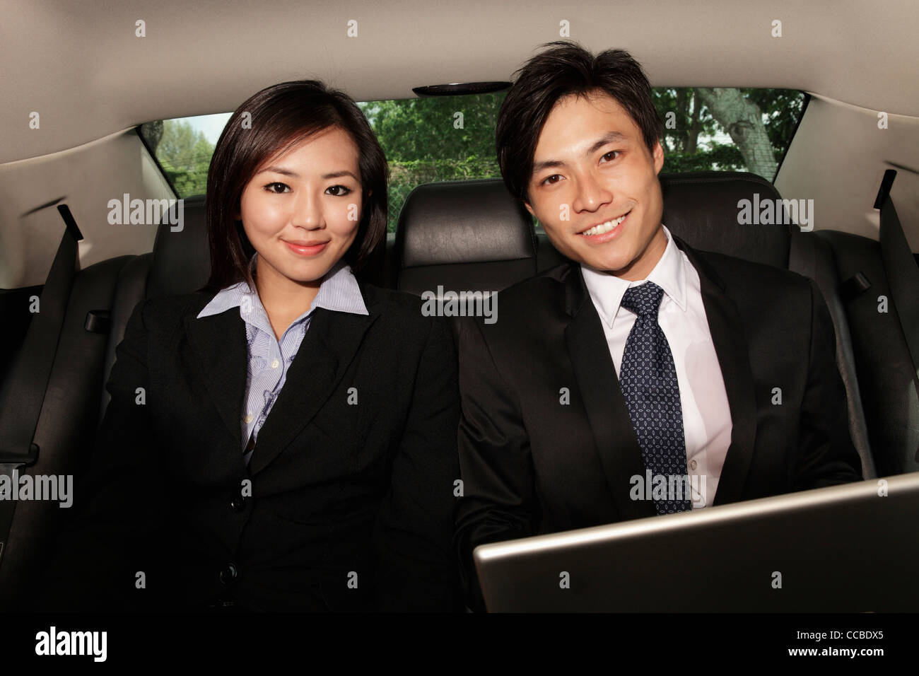 Men wearing black suits hi-res stock photography and images - Alamy