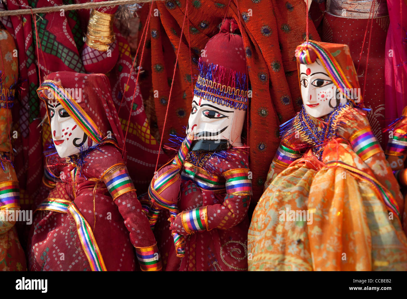 Traditional Rajasthani puppet dolls on sale as souvenirs in Stock Photo