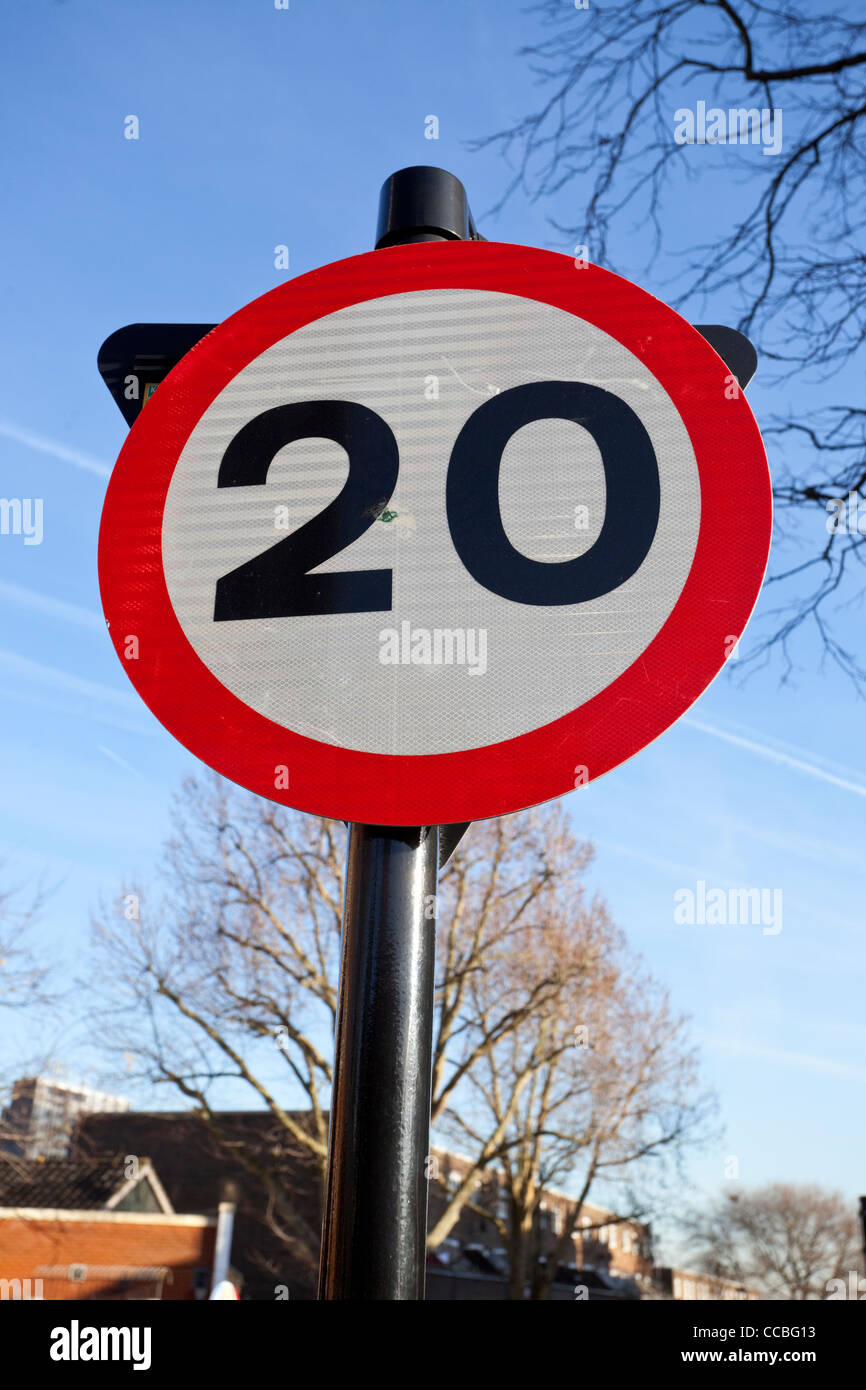 Maximum Speed Limit 20 MPH and Bend to the Left Ahead road
