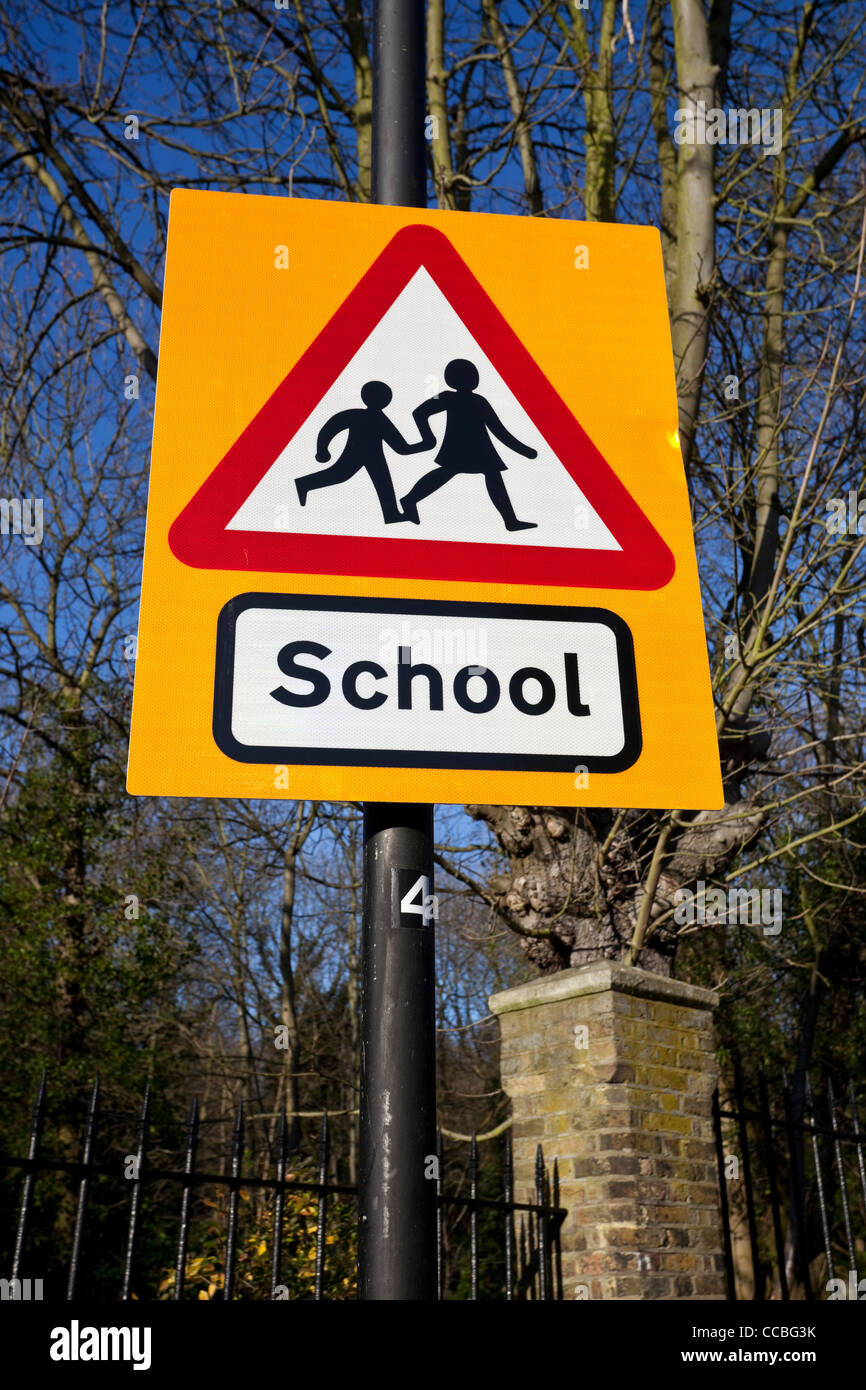School upright traffic sign, warning triangle, England, UK Stock Photo