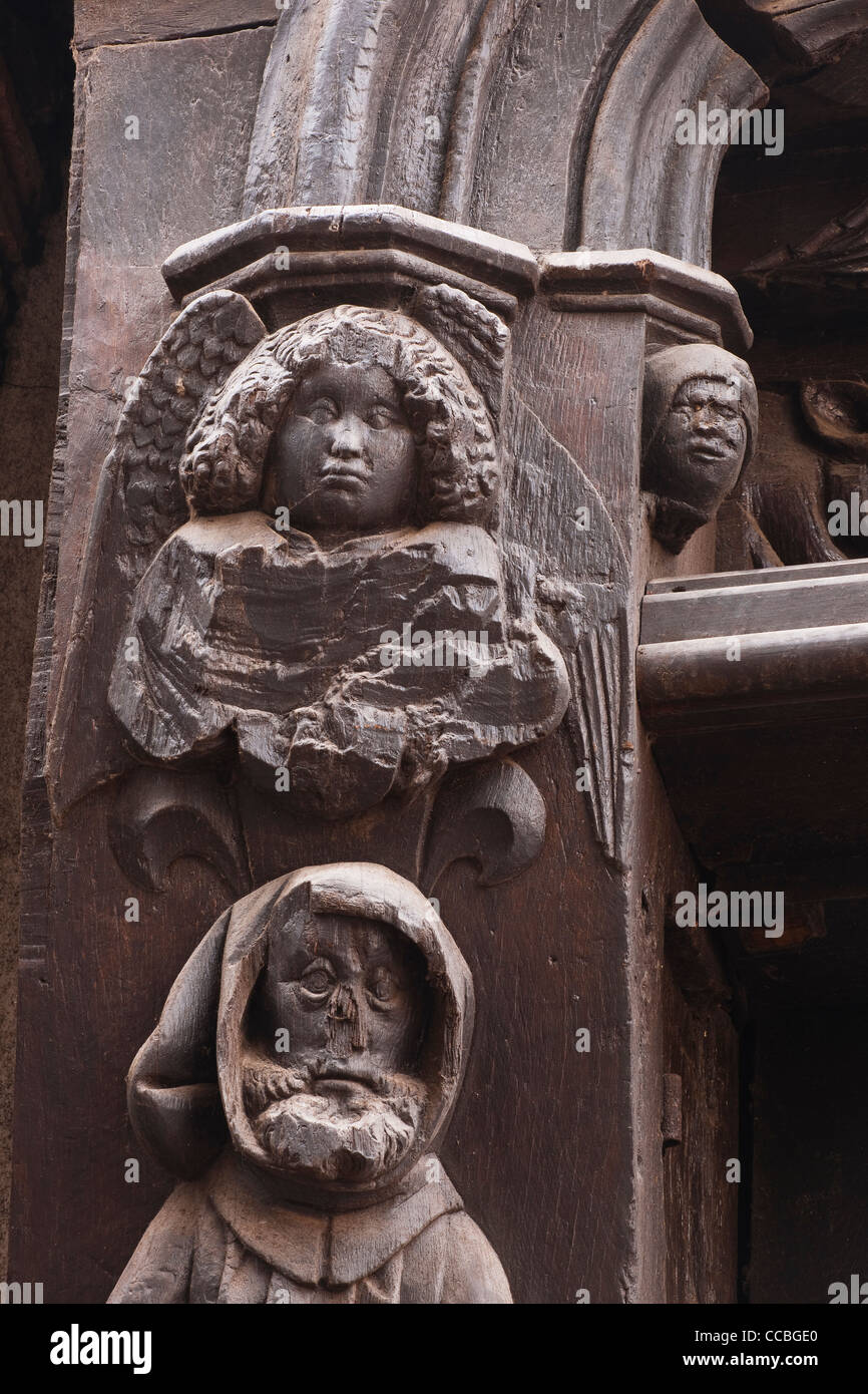 15th century carved wooden figures, Place Plumereau, Tours, Indre-et-Loire, France. Stock Photo