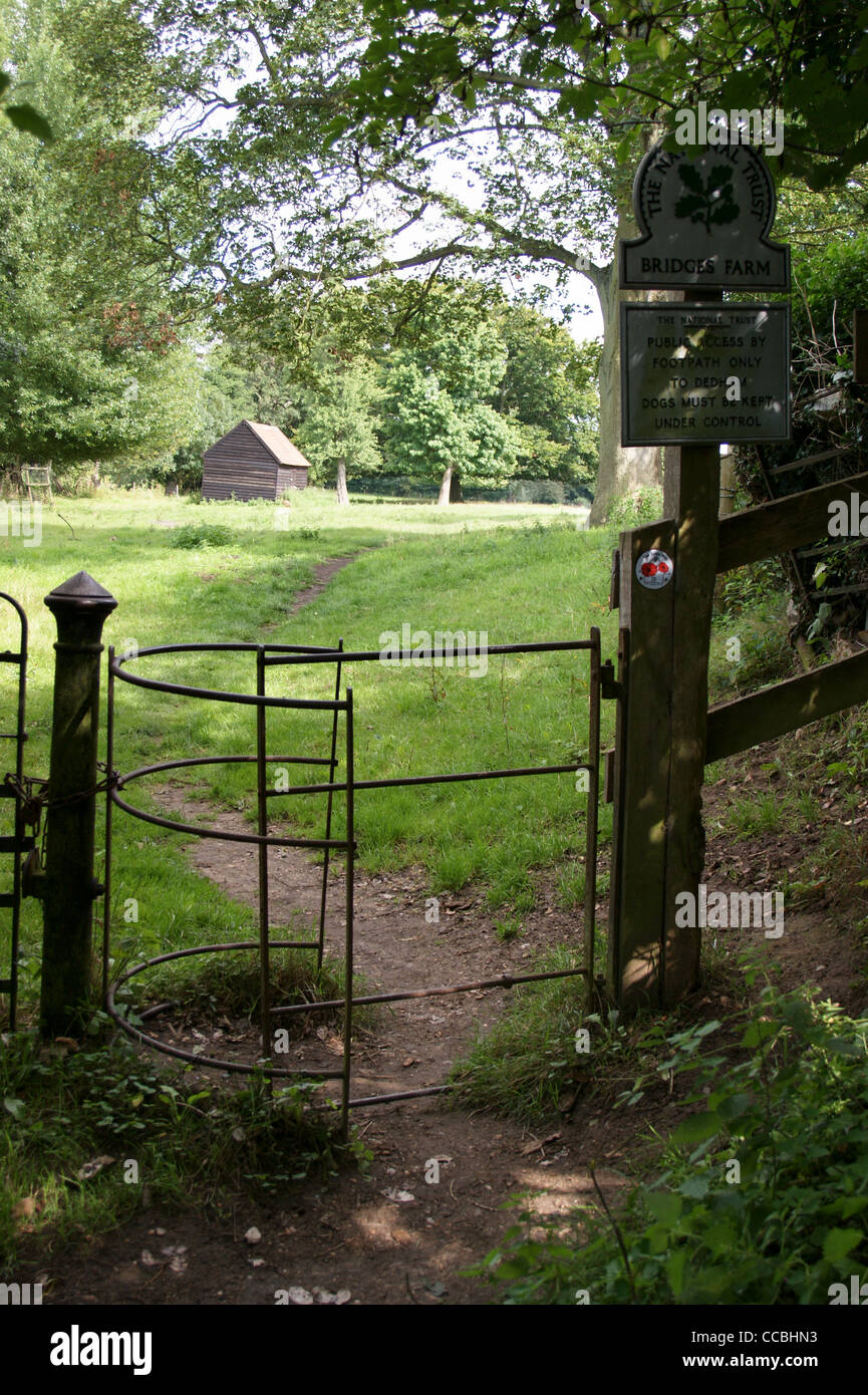 Wrought iron kissing gate on a public footpath at Bridges Farm on the Essex Way long distance footpath near Dedham Essex England Stock Photo