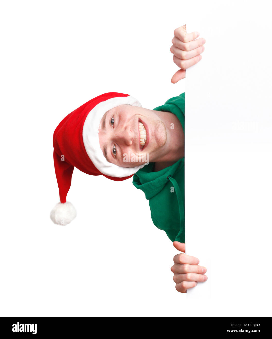 Christmas Guy with santa hat and sign Stock Photo Alamy
