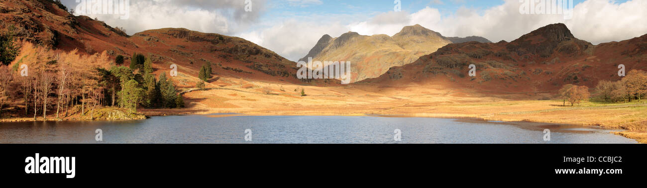 The Langdale Pikes and Side Pike as seen from Blea Tarn in late autumn Stock Photo