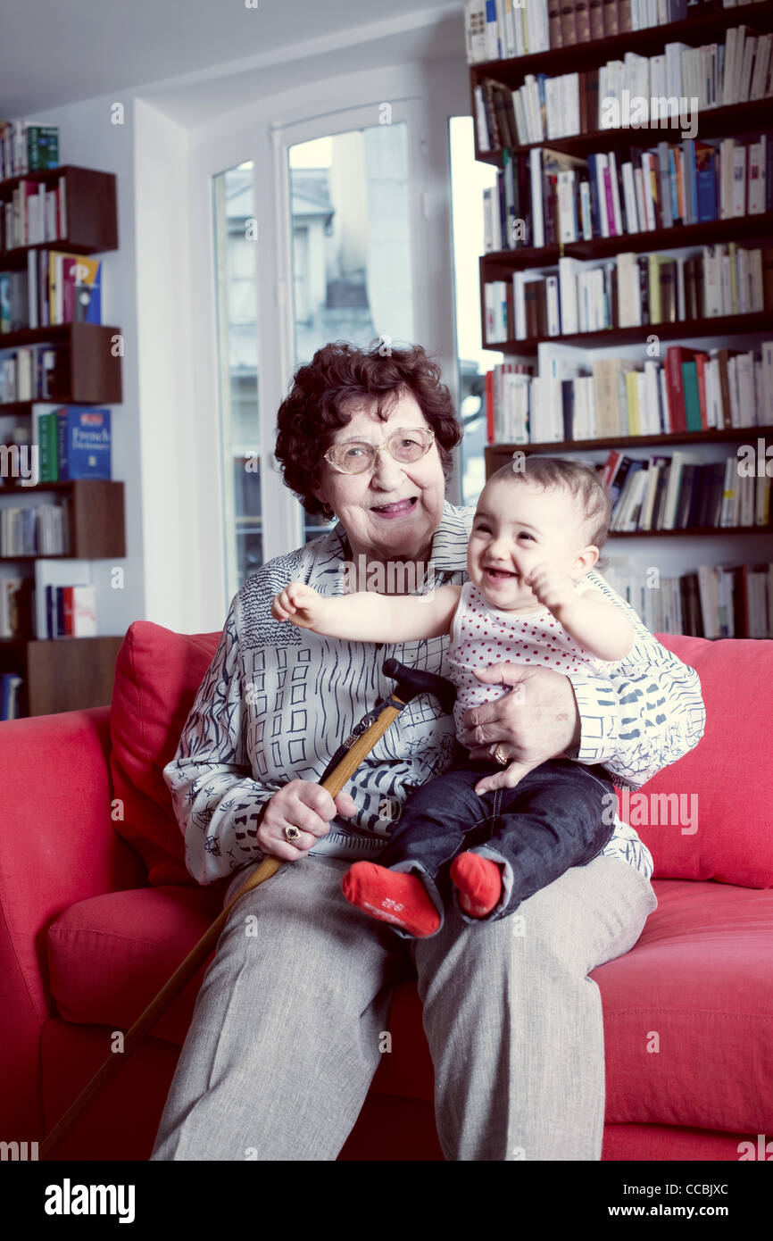 Grandmother holding baby granddaughter, portrait Stock Photo