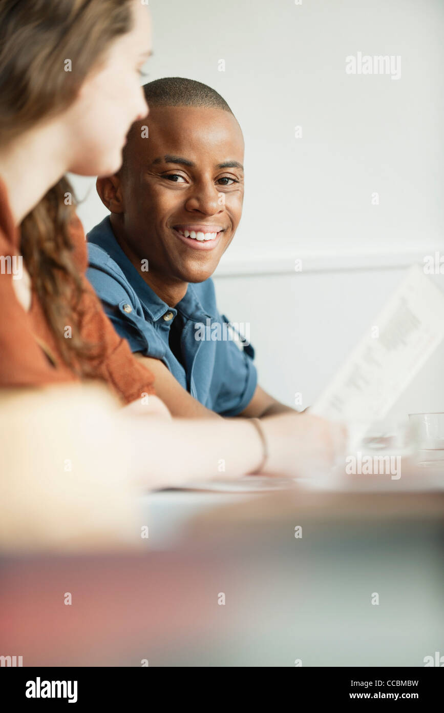 Young man hanging out with friend Stock Photo Alamy