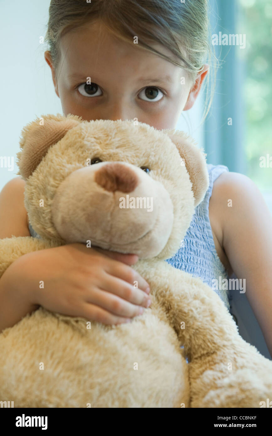 Girl Hugging Teddy Bear