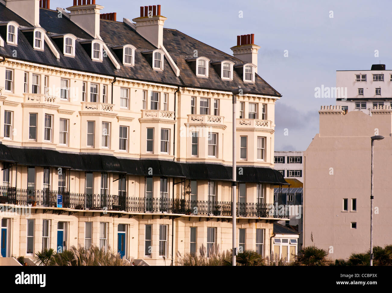 19th Century Victorian Terrace Terraced Buildings Houses with Stucco Architecture Marine Crescent Folkestone Seafront Kent UK Stock Photo