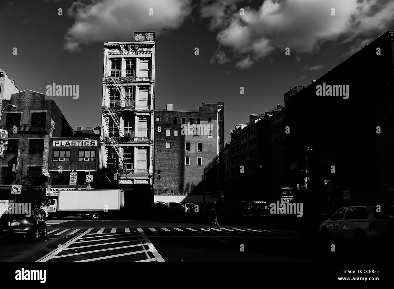 A lone apartment building stands on Canal street in New York City, USA. Stock Photo