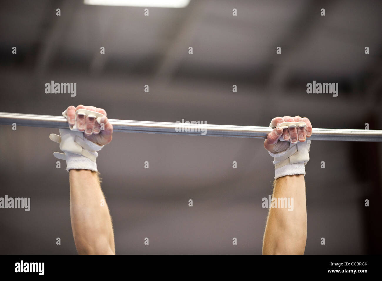 Gripping the bar hires stock photography