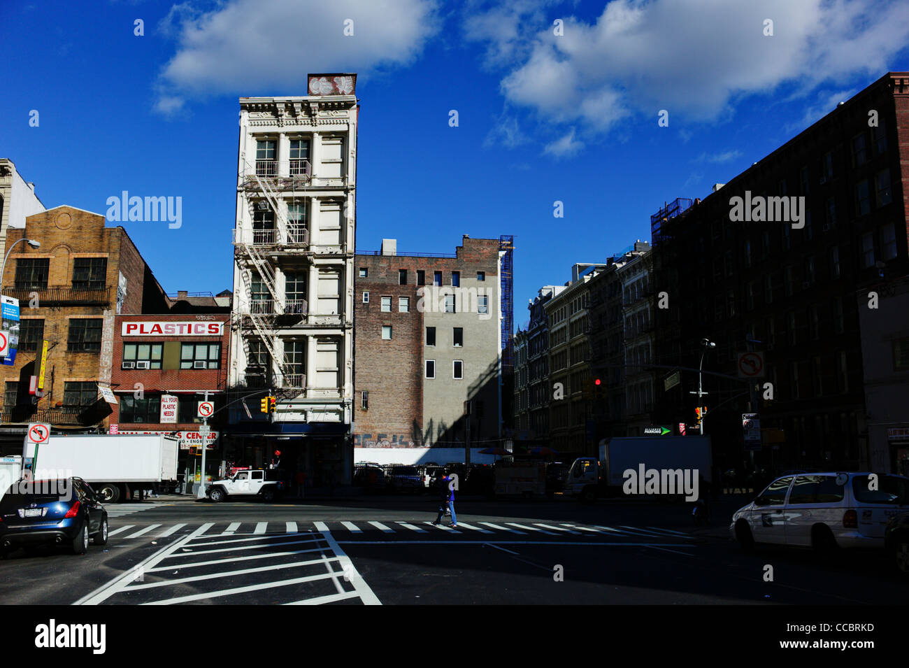 A lone apartment building stands on Canal street in New York City, USA. Stock Photo