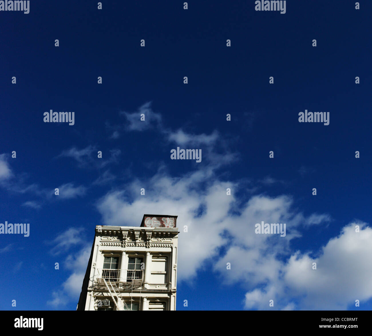 A lone apartment building stands on Canal street in New York City, USA