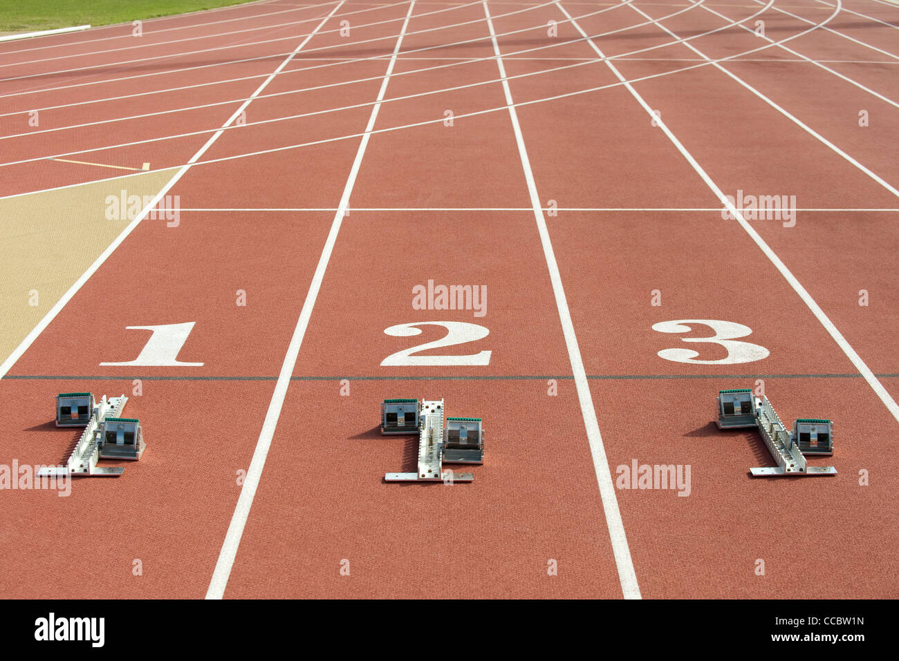 Starting blocks at starting line on running track Stock Photo Alamy