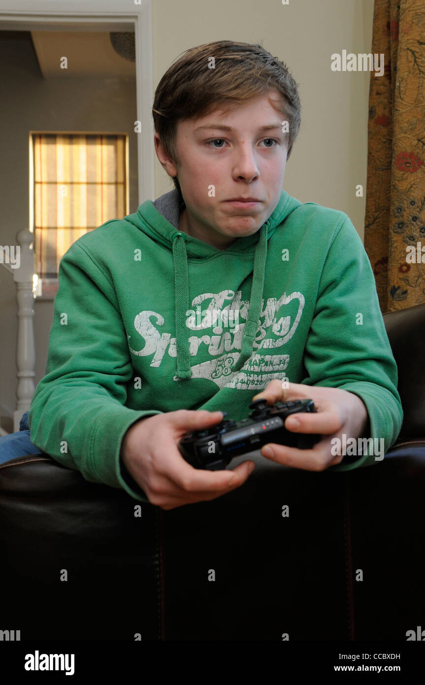 Teenage Boy Playing A Computer Game Stock Photo - Alamy