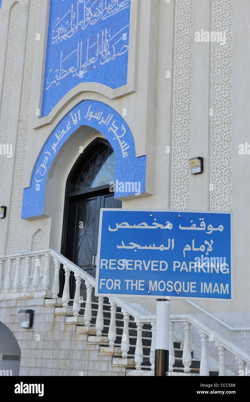 Being an Imam has its own set of advantages, you don't have to worry about parking in front of the mosque; Muttrah, Muscat, Oman Stock Photo
