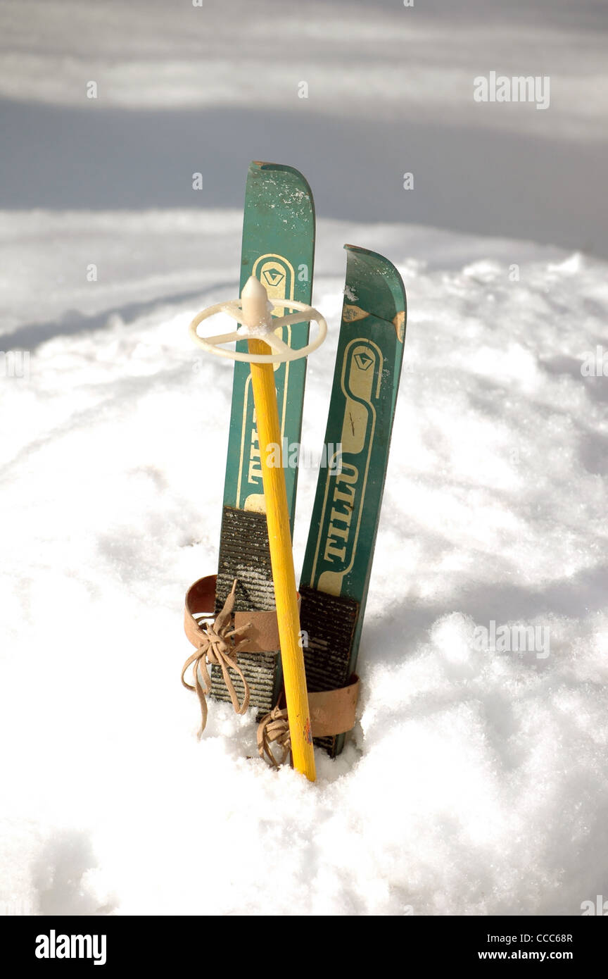 Pair of old wooden child skis Stock Photo