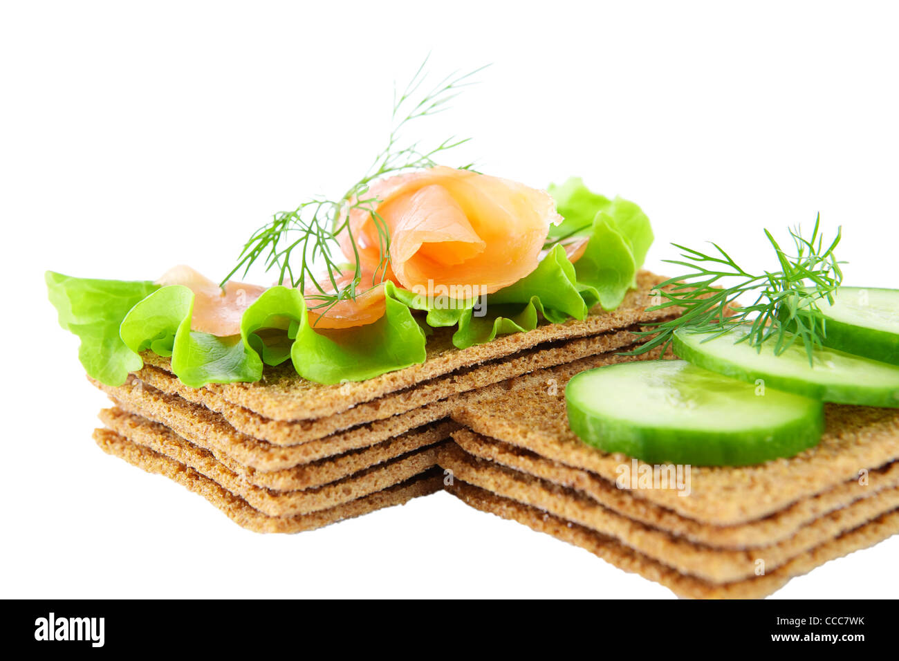Sandwiches with salmon and cucumber on a white background Stock Photo
