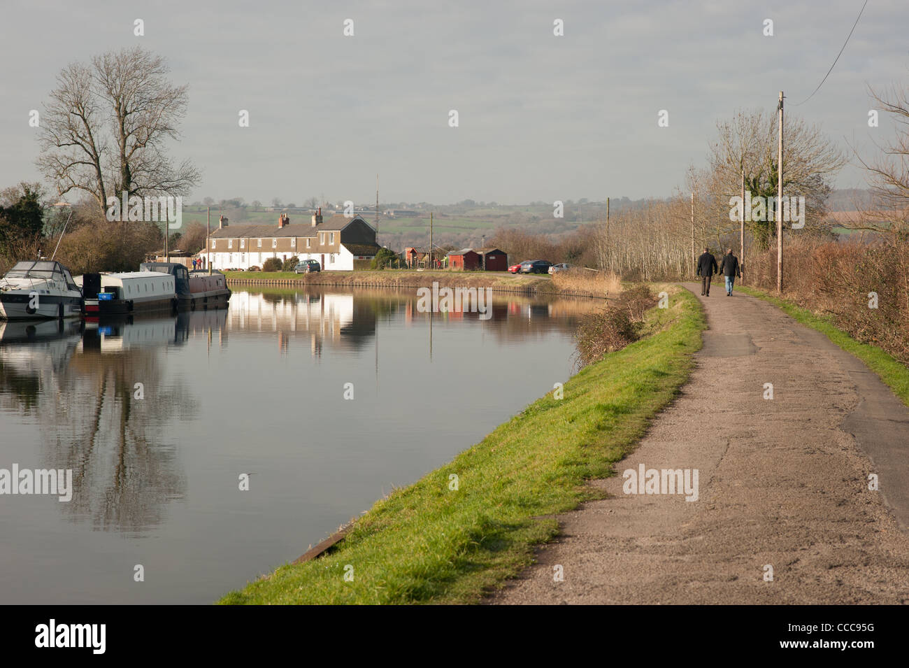 Towpath Couple walking down canal towpath Stock Photo - Alamy