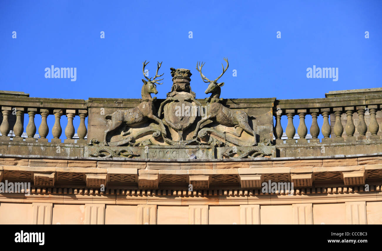 The Crest at the top of the Crescent Building in Buxton with real antlers from Chatsworth. Stock Photo