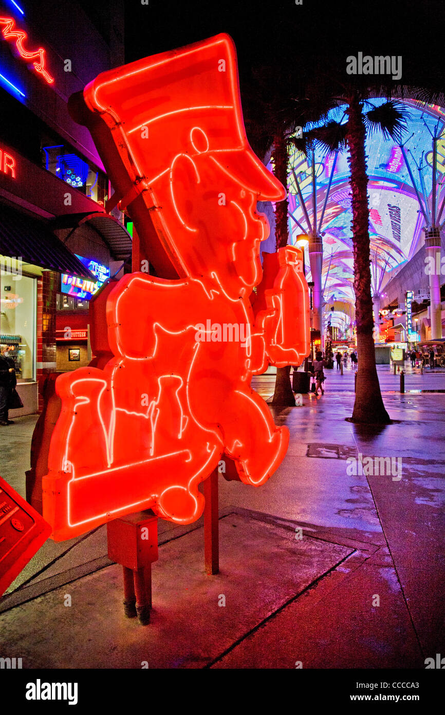 Andy Anderson, a milkman sign in red neon decorates Fremont Street in Las Vegas, NV,  part of the 'Fremont Street Experience'. Stock Photo