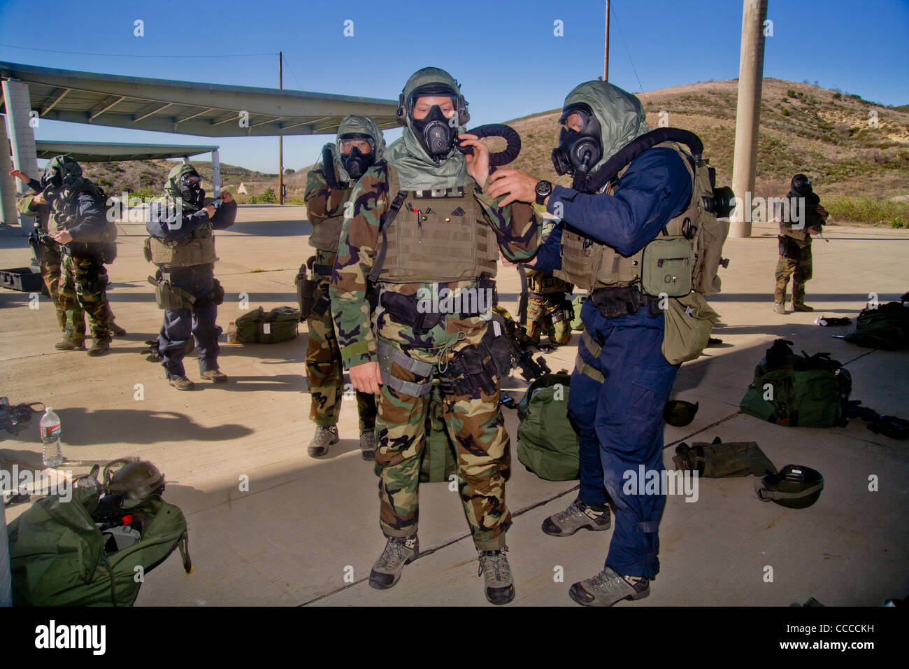 FBI SWAT (Special Weapons and Tactics) team members wear specialized 'Weapons of Mass Destruction' equipment for training drills Stock Photo