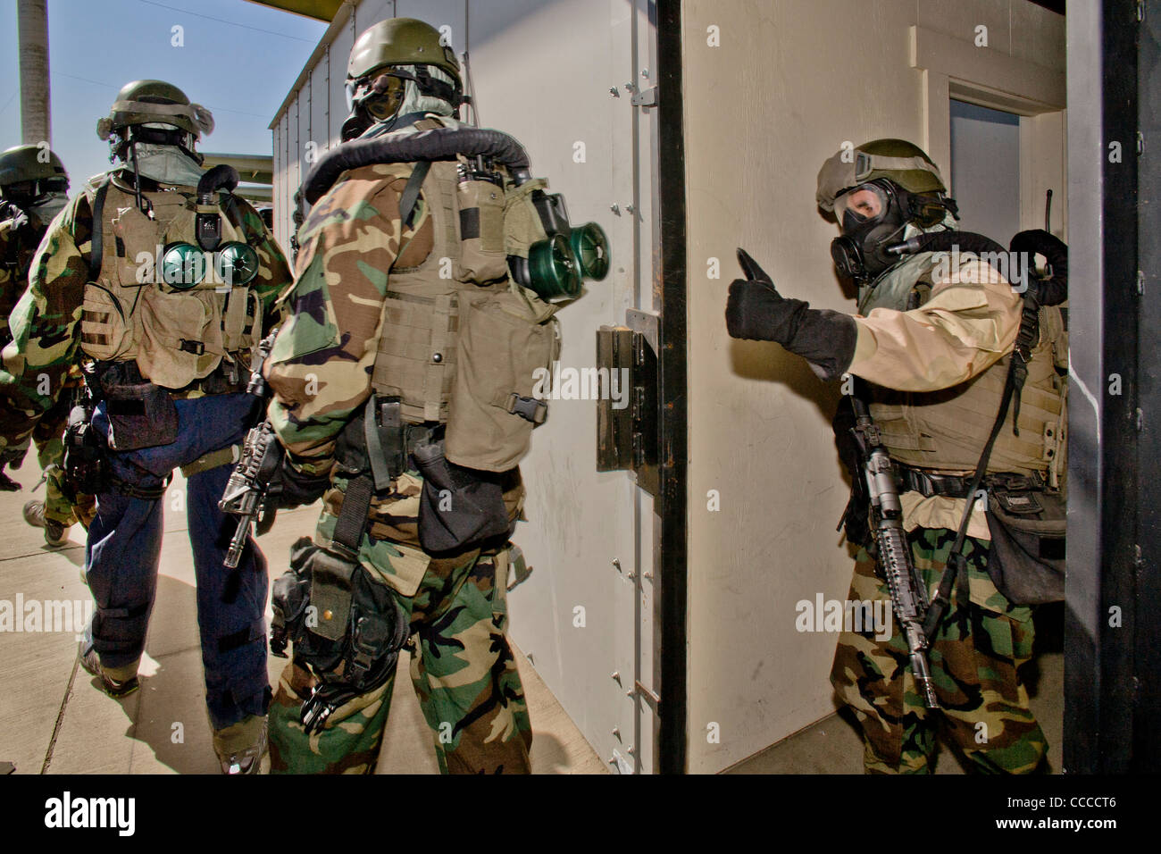 FBI SWAT (Special Weapons and Tactics) team member wears specialized 'weapons of Mass Destruction' equipment  during training Stock Photo
