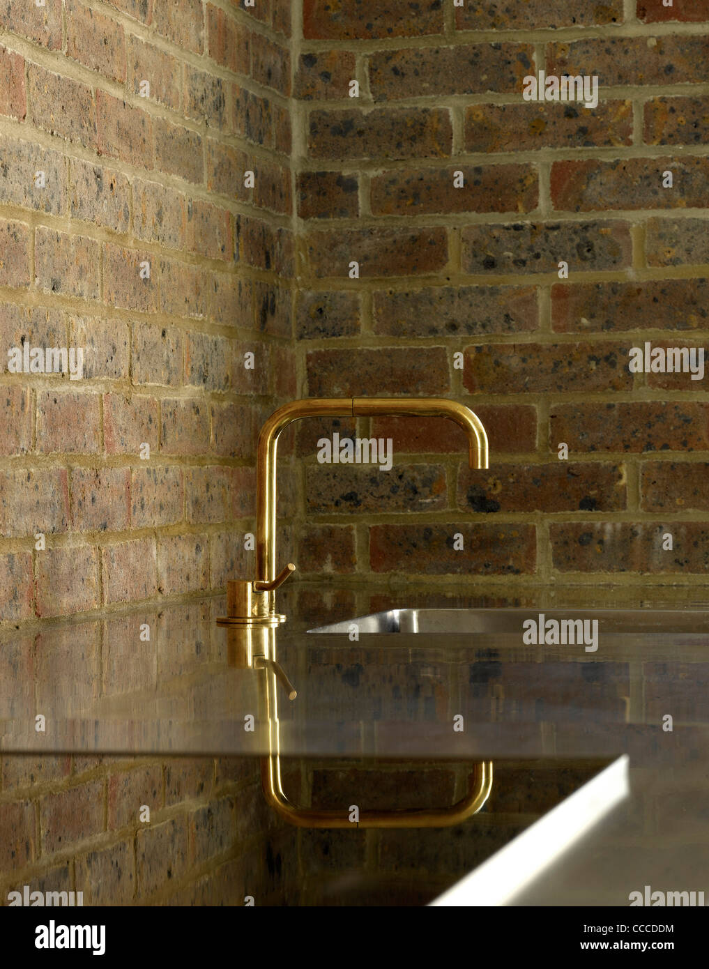 HOUSE ON KINGS GROVE-DUGGAN MORRIS ARCHITECTS-LONDON-BRASS TAP ON SINK Stock Photo