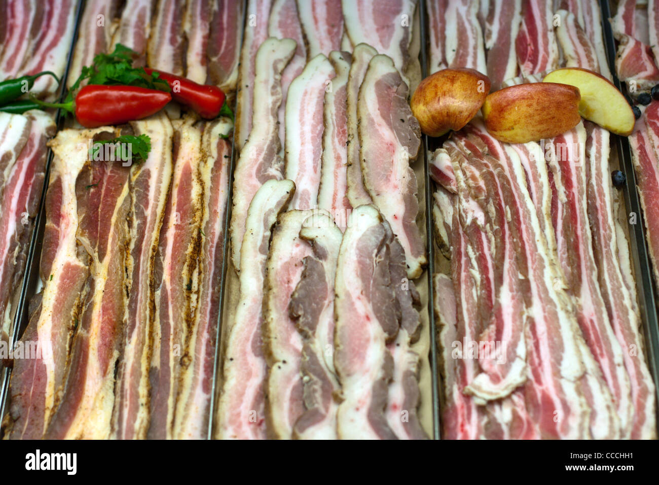 Bacon, pork belly in grocery store display Stock Photo Alamy