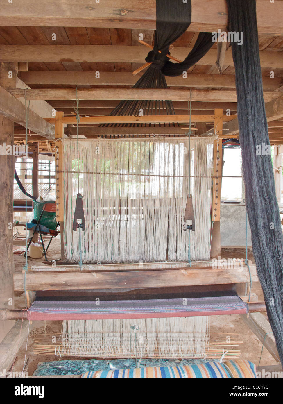 Traditional loom made of wood in the northern part of Thailand Stock Photo