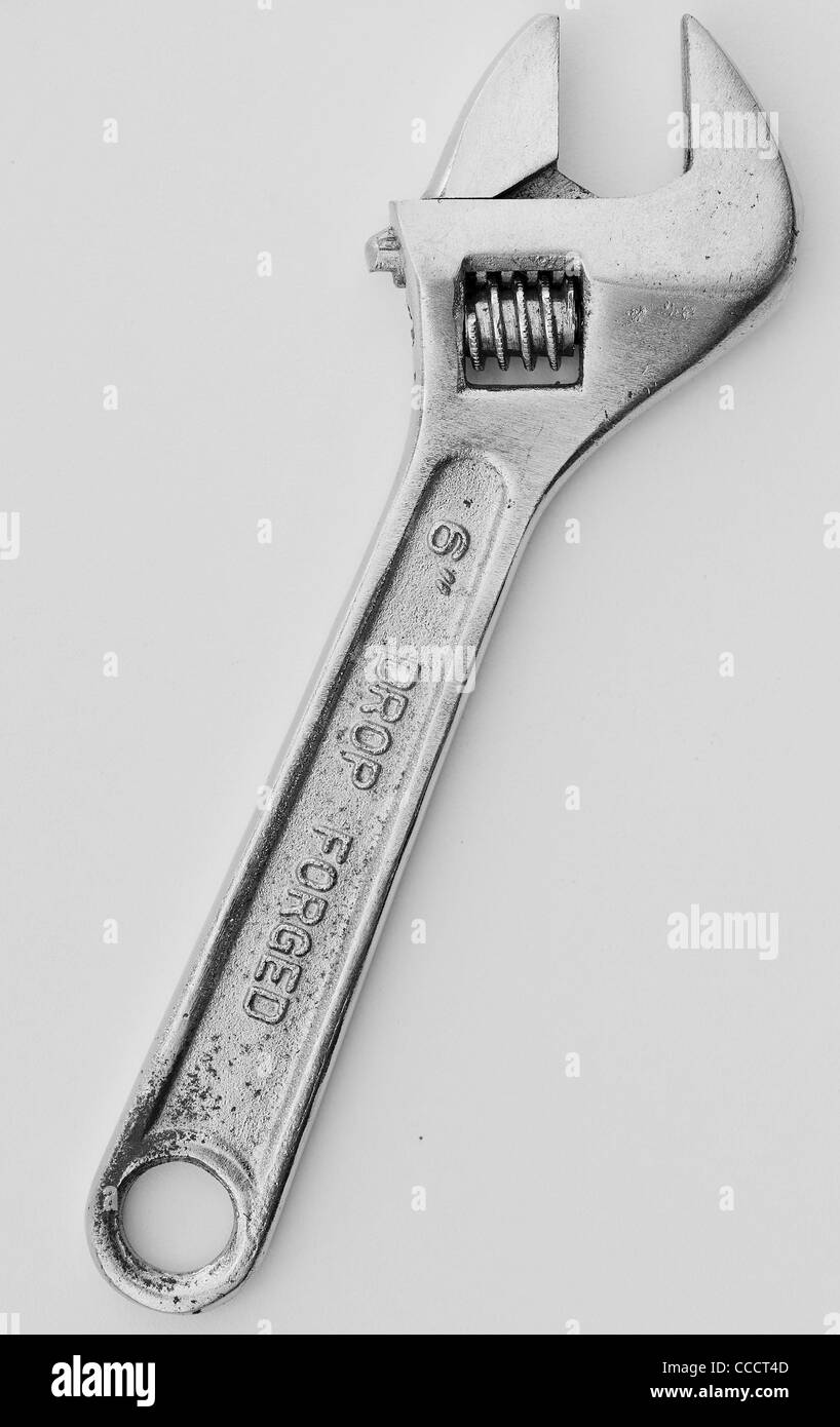 An adjustable spanner isolated on an off white background Stock Photo