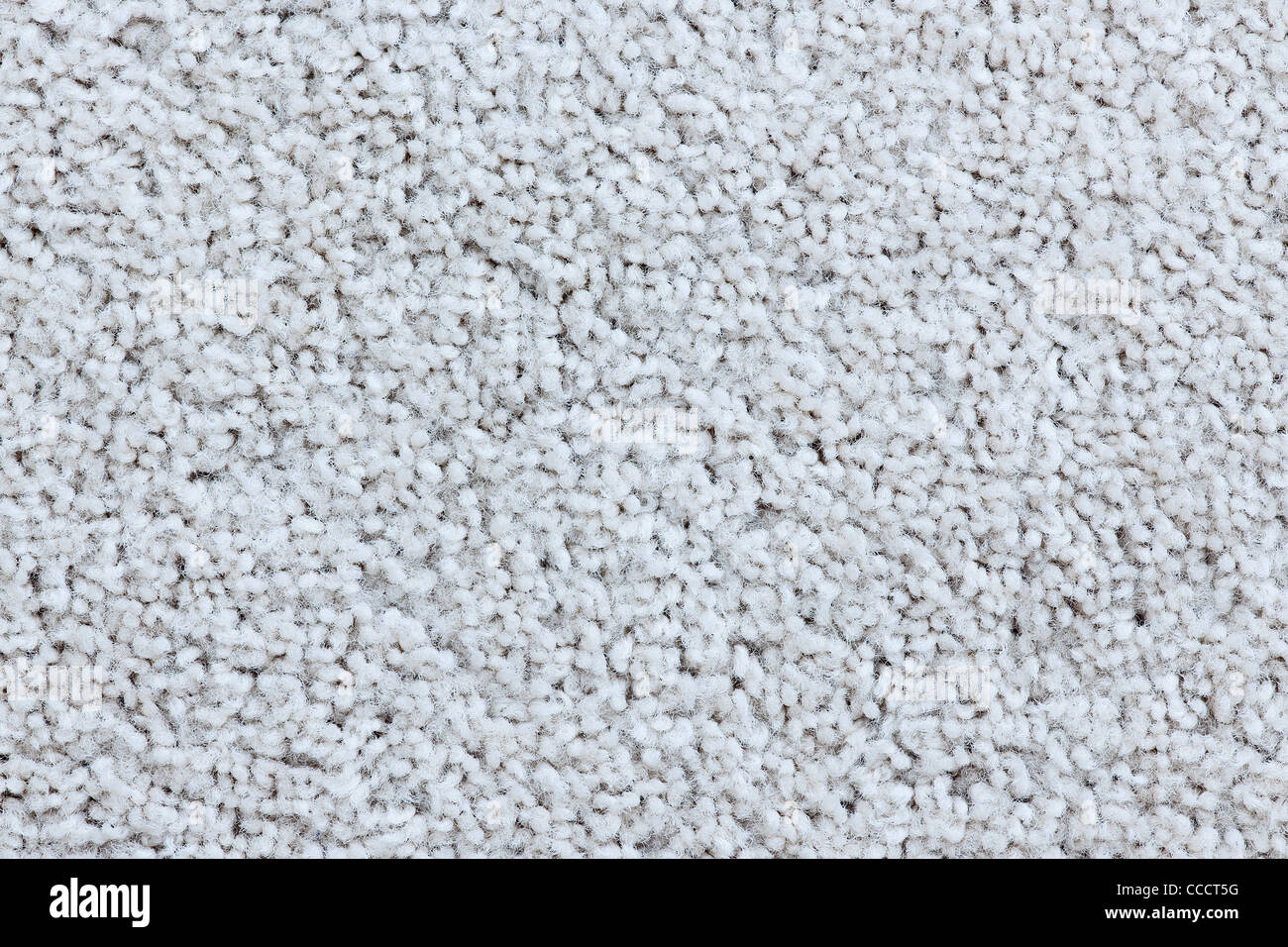 White carpet up close creating a beautiful textured background image. Stock Photo