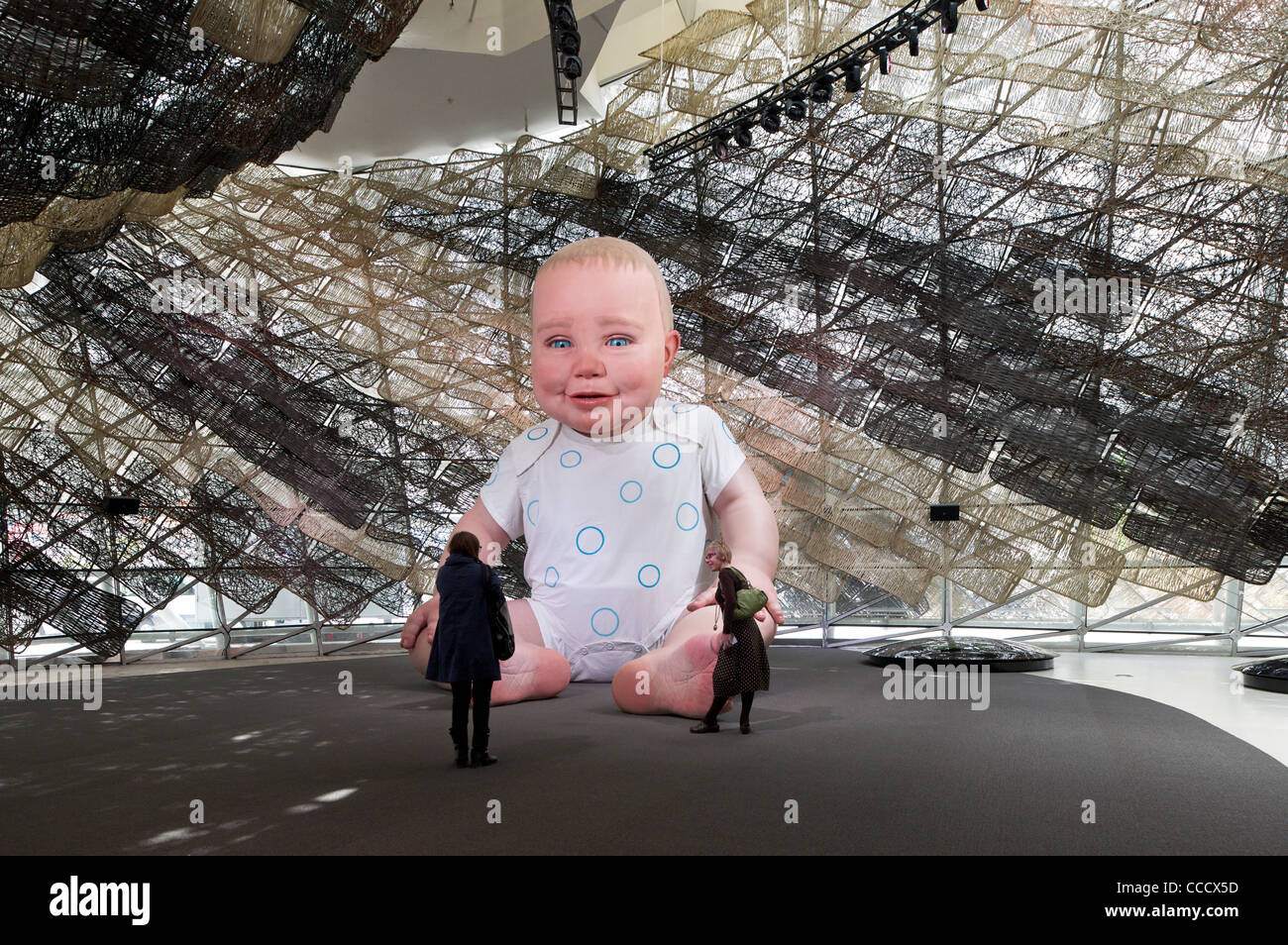 Spain''S Pavilion Is Made Of Wicker On The Exterior. It Features A Giant Animated Baby Installation.It Is Built By Miralles Stock Photo