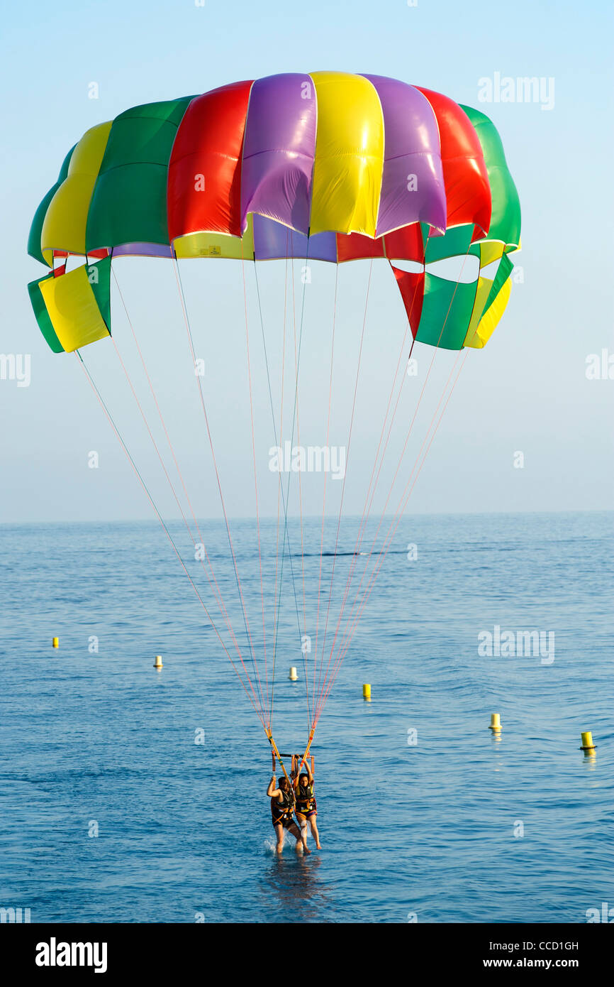 Colourful parasail in the Baie des Anges (Bay of Angels) in Nice on the Mediterranean coast in southern France. Stock Photo
